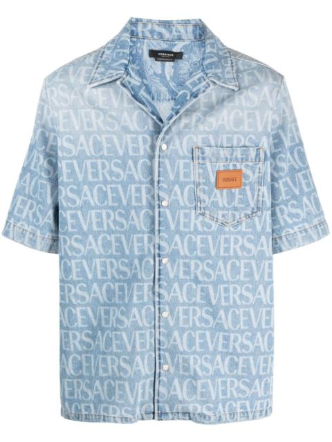 VERSACE Allover logo-print denim shirt