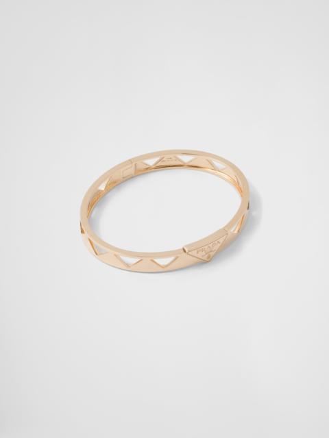 Prada Eternal Gold cut-out bangle bracelet in yellow gold