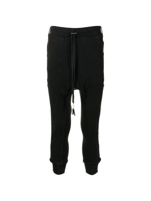 drop-crotch track pants