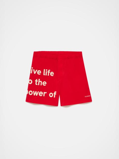 JW Anderson Unisex JW ANDERSON X GUINNESS SLOGAN TRACK SHORTS IN RED