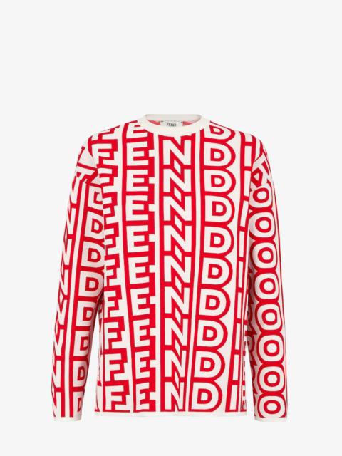 FENDI Sweater made in a white and red viscose knit. The Fendi logo is reinterpreted by Marc Jacobs in an a