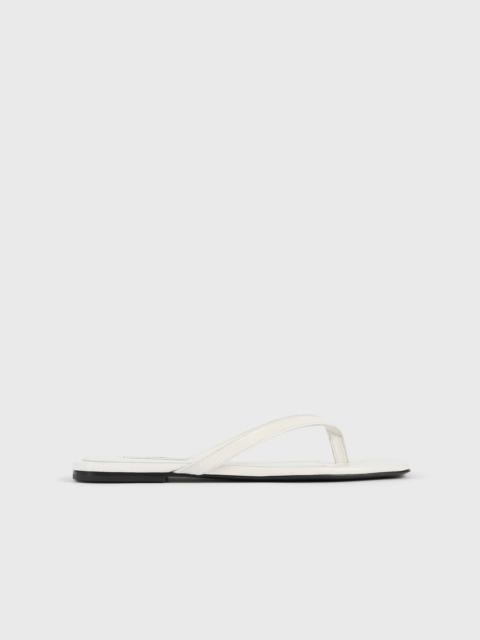 TOTEME Croco-embossed flip flops off-white