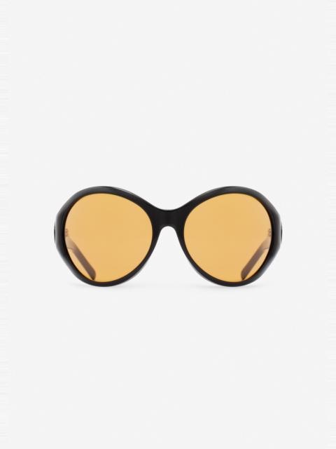 MAGDA BUTRYM Big round sunglasses in black with yellow lenses