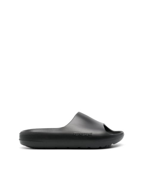 REPRESENT side engraved-logo slides