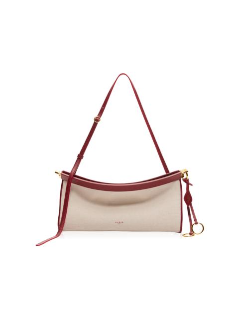 Alaïa Le Click E/W Leather-Trimmed Bag neutral