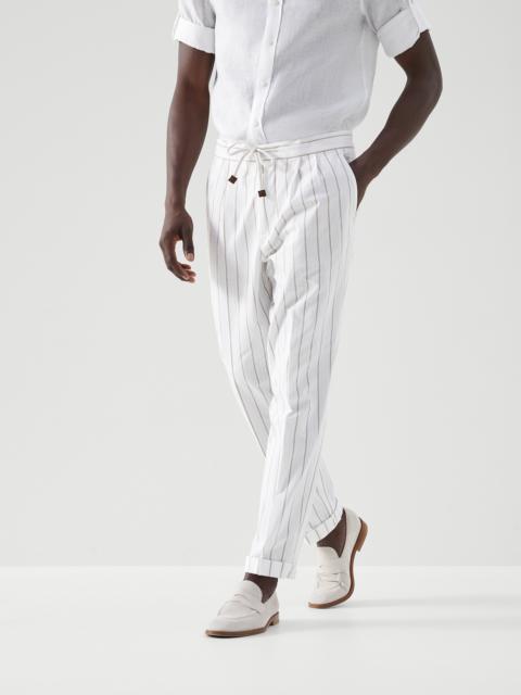 Striped cotton leisure fit trousers with double pleats and drawstring