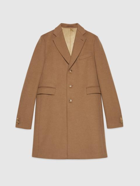 Camelhair coat with Gucci cities label