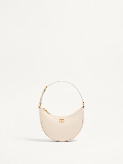 VLOGO SIGNATURE MINI HOBO BAG IN GRAINY CALFSKIN
