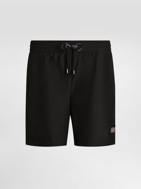 Dolce & Gabbana Mid-length swim trunks with logo tag