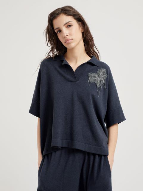 Cashmere knit polo with precious flower crest