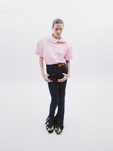 A.W.A.K.E. MODE FITTED STRETCH FLARED JEANS WITH SIDE SLITS INDIGO RINSE WASH