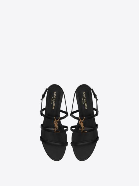 SAINT LAURENT cassandra flat sandals in smooth leather with gold-tone monogram