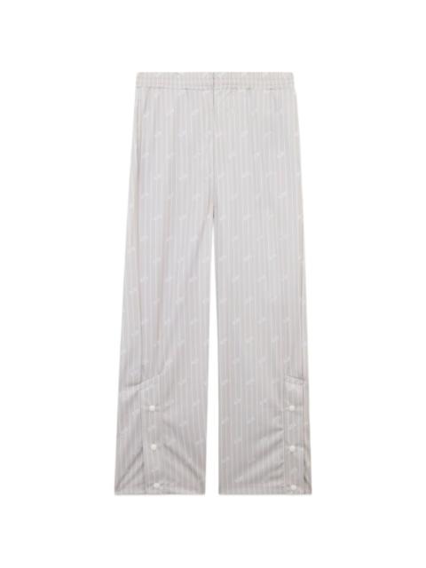 GCDS pinstripe logo-motif track pants