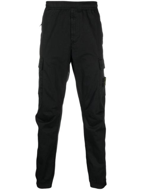 Stone Island logo-patch tapered-leg trousers