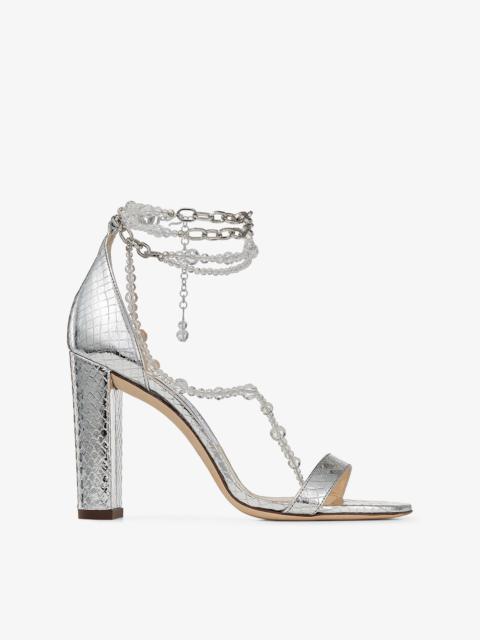 JIMMY CHOO Neena 100
Silver Leather Sandals with Chain and Glass Bead Embellishment