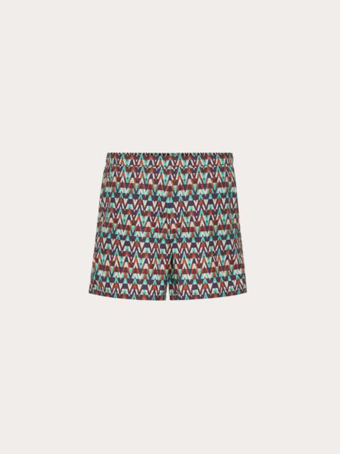 Valentino SWIM SHORTS WITH OPTICAL VALENTINO PRINT