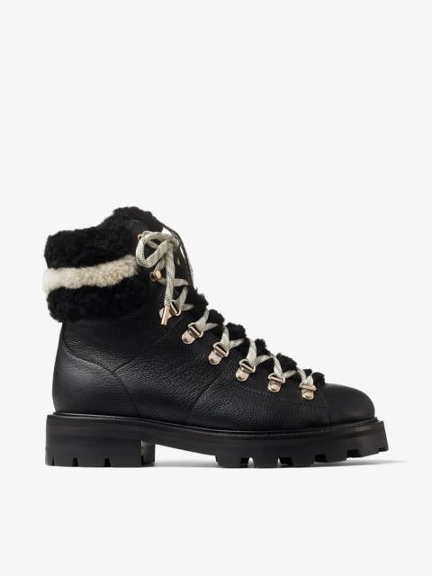 JIMMY CHOO Eshe Flat
Black Grainy Leather Hiking Boots with Natural and Black Shearling Collar