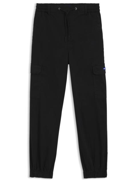 HUGO RELAXED-FIT PANTS IN WASHED STRETCH COTTON