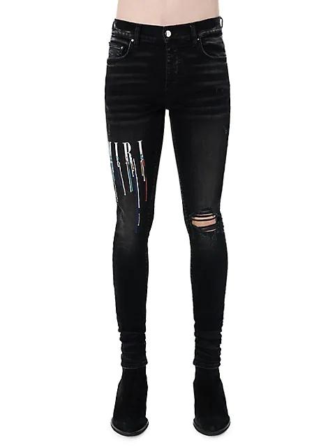 AMIRI logo-embroidered skinny jeans