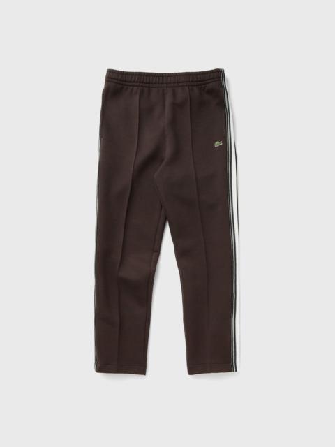 LACOSTE TRACKSUITS & TRACK TROUS.