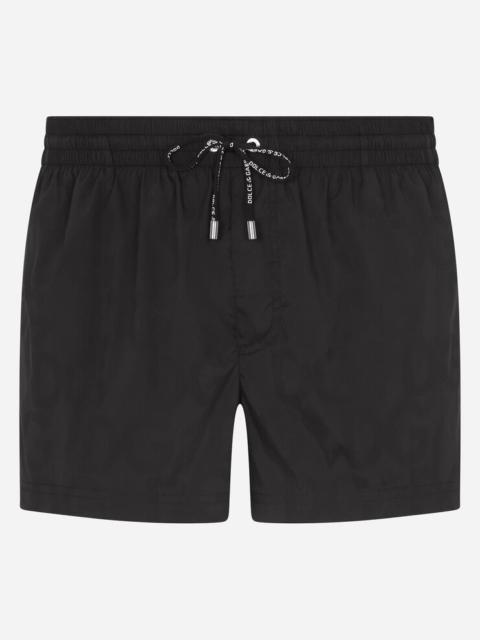 Dolce & Gabbana Short swim trunks in hydro-sensitive fabric with logo print