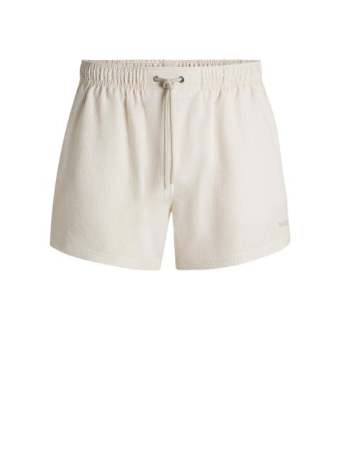 BOSS SWIM SHORTS IN STRIPED SEERSUCKER FABRIC
