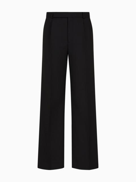 Trousers with a pleat in a natural stretch tropical light wool