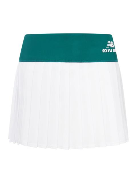 Miu Miu NEW BALANCE X MIU MIU PLEATED TENNIS SKIRT FEATURING COCO GAUFF