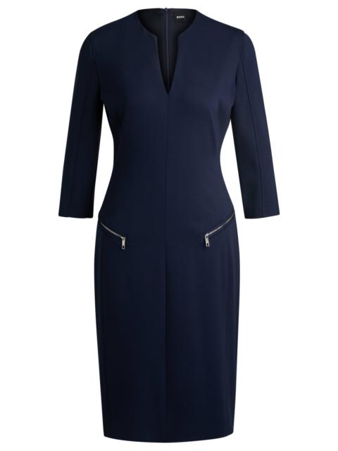 V-NECK DRESS WITH ZIPPED POCKETS AND CROPPED SLEEVES