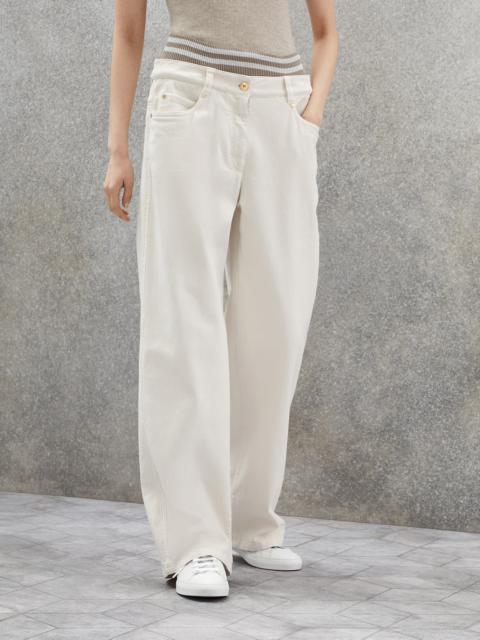 Brunello Cucinelli Dyed comfort denim loose five-pocket trousers with striped knit insert and shiny bartack