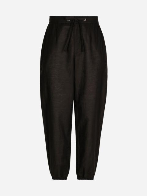 Dolce & Gabbana Linen and cotton jogging pants with logo label
