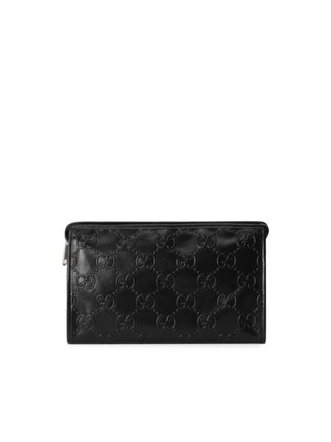 GUCCI GG-embossed clutch bag