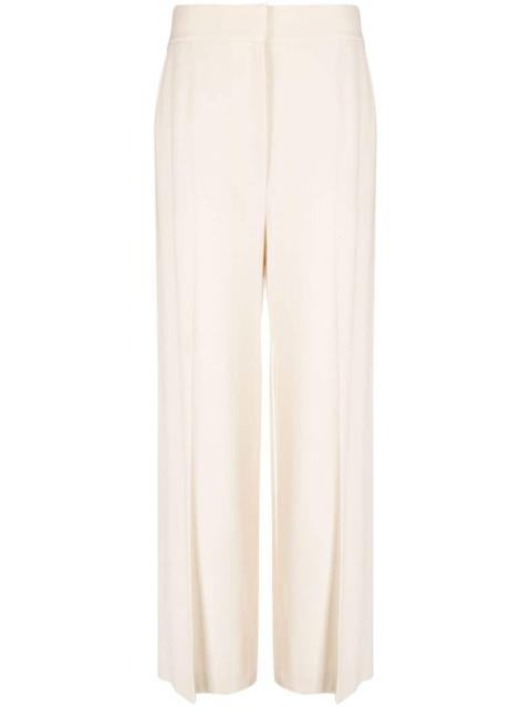 KHAITE high-waisted wide-leg trousers
