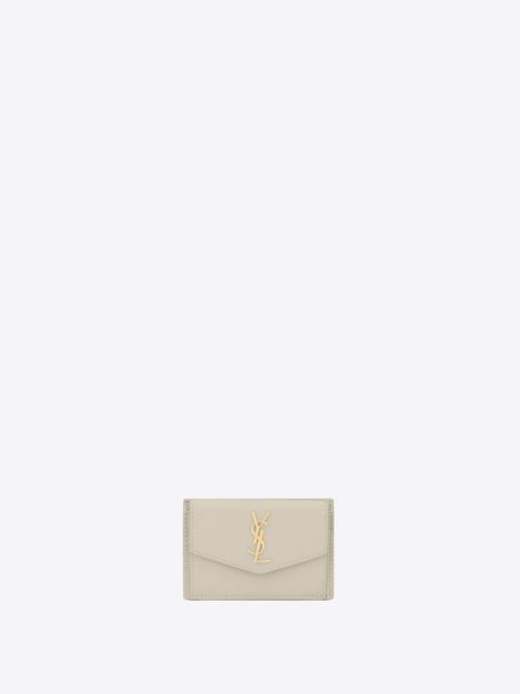 SAINT LAURENT uptown card case in grain de poudre embossed leather