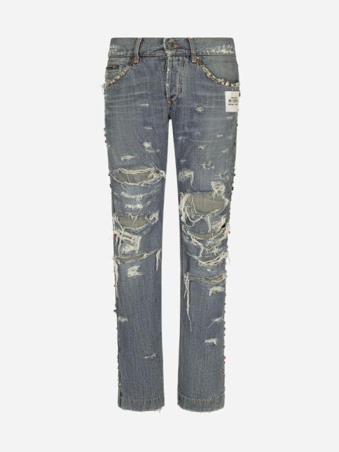 Dolce & Gabbana Washed denim jeans with studs and rips
