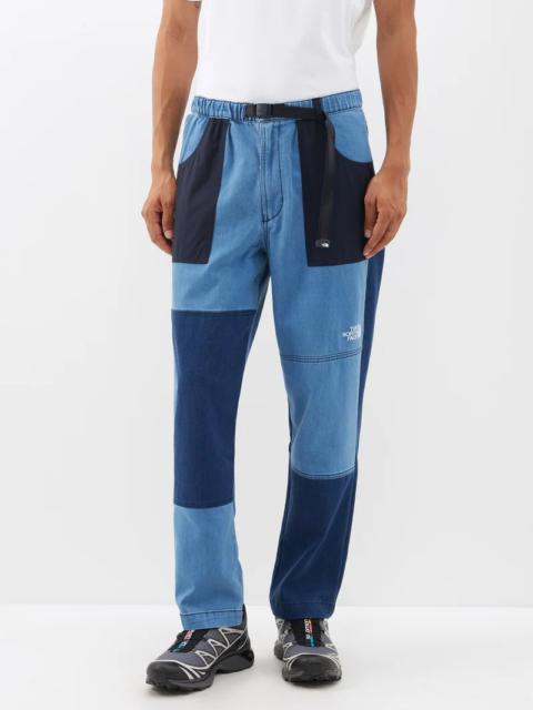 The North Face Patchwork belted-waist denim trousers