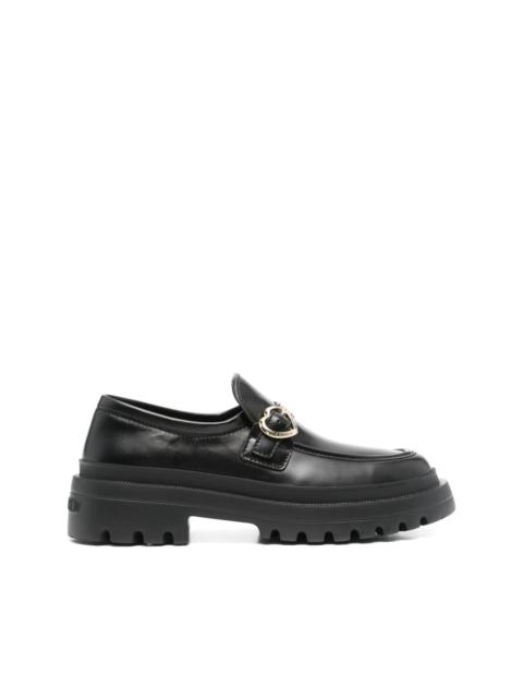 Moschino decorative buckle-detail loafers
