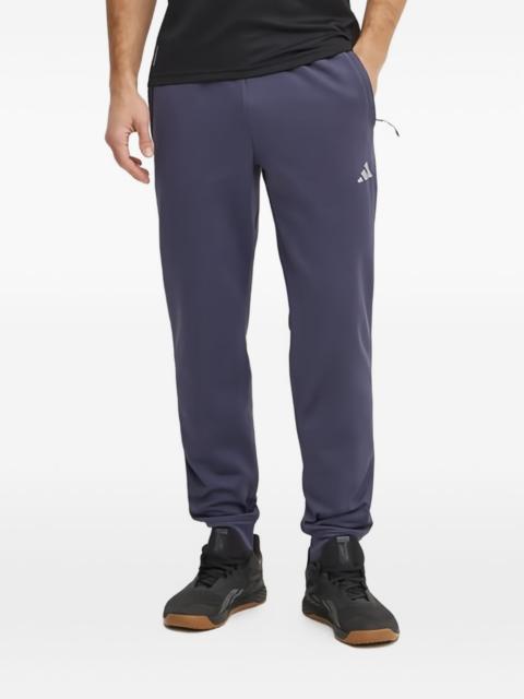 adidas logo-pattern track pants