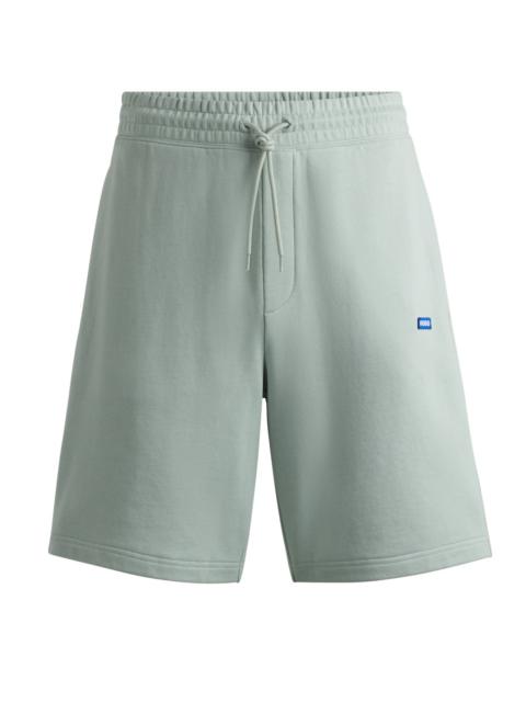 HUGO COTTON-TERRY SHORTS WITH BLUE LOGO PATCH
