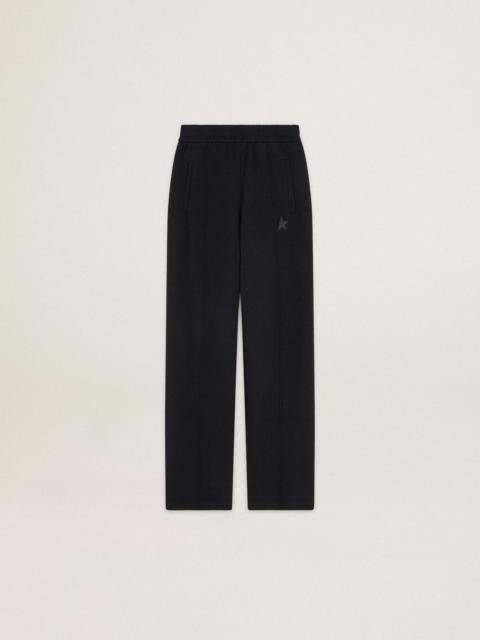 Women's black joggers with star on the front
