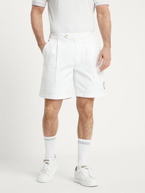 Bonded nylon pleated Bermuda shorts with tabbed waistband and tennis badge