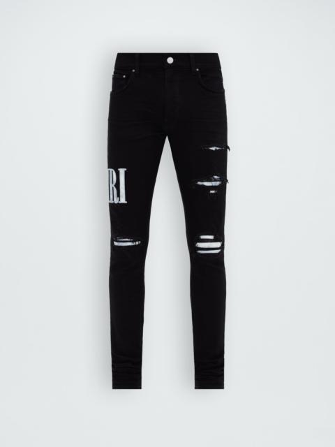 AMIRI TIE DYE CORE LOGO JEAN