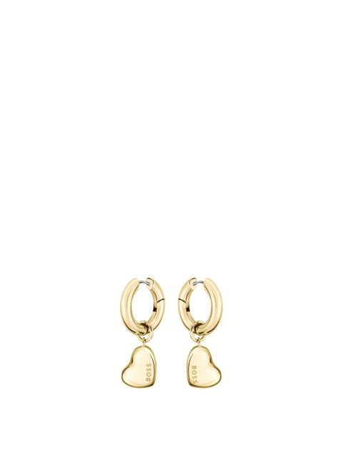 GOLD-TONE HUGGIE HOOP EARRINGS WITH HEART CHARMS
