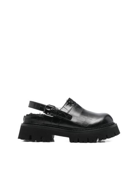 Moschino buckle embossed leather mules