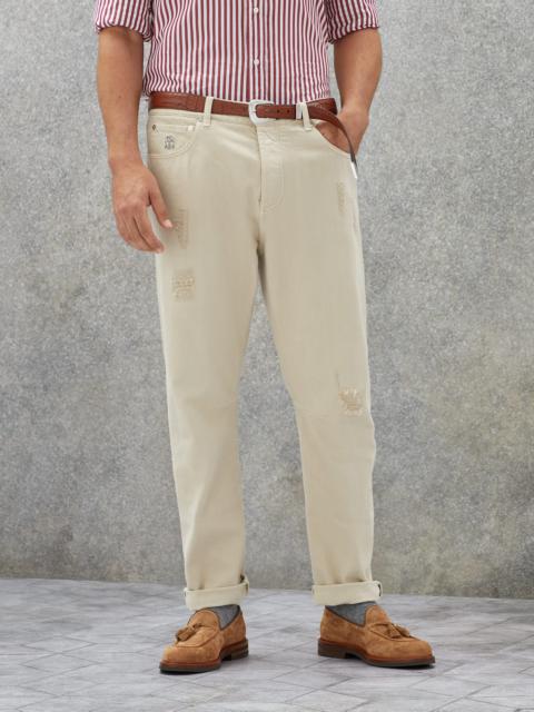 Brunello Cucinelli Garment-dyed slubbed denim leisure fit five-pocket trousers with rips