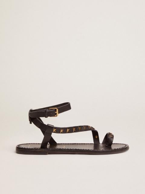 Golden Goose Women's flat sandals in black leather with gold stars
