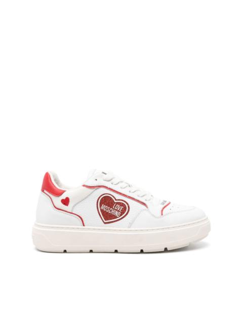 Moschino logo-patch leather sneakers