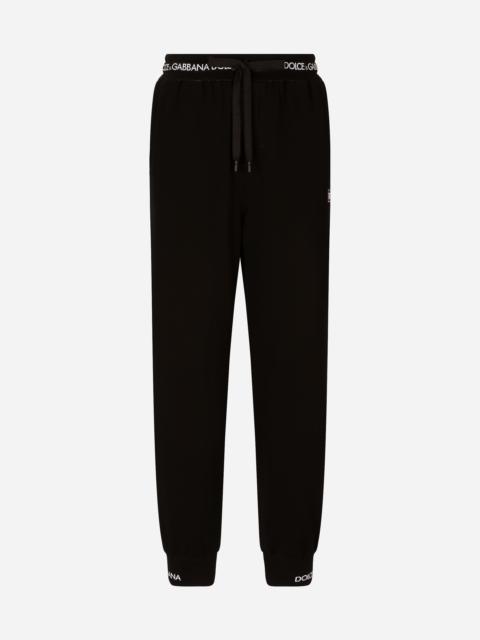 Dolce & Gabbana Cotton jogging pants with logo print