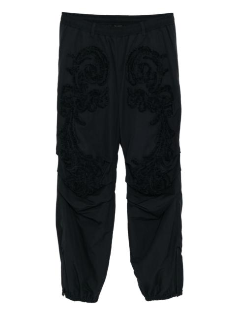 TAAKK sculpture track pants