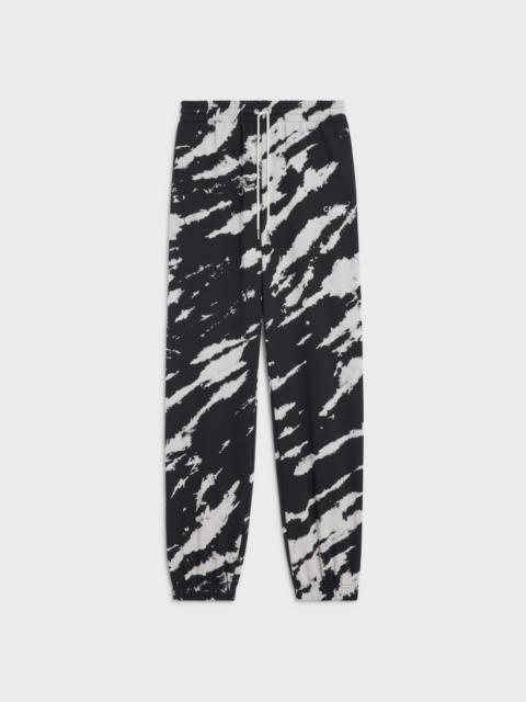CELINE LOOSE TIE-DYE TRACK PANTS IN JERSEY FLEECE